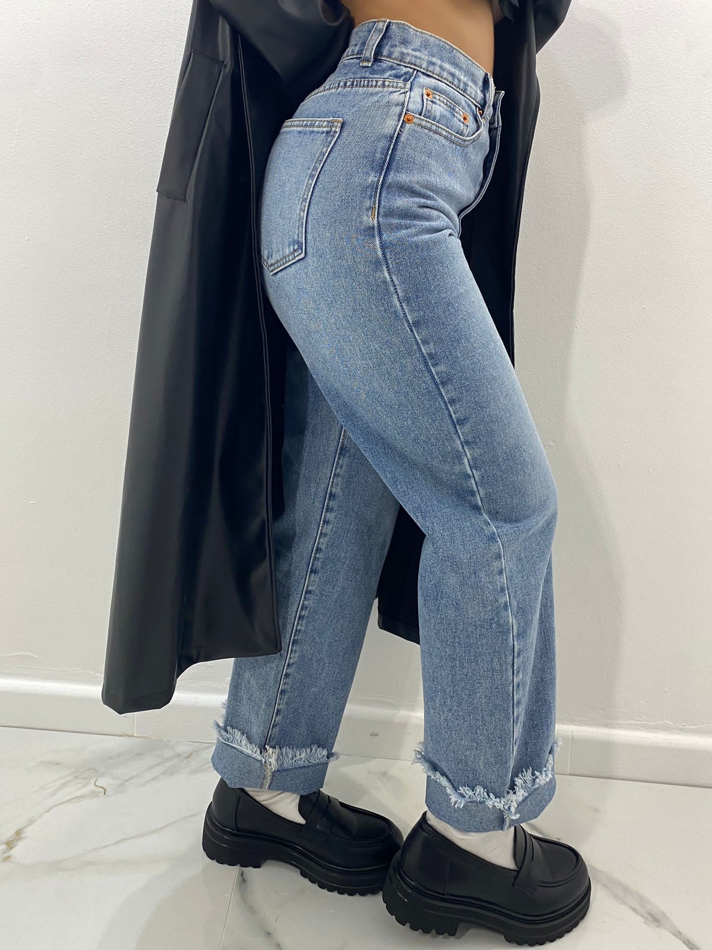 Jeans con strappo