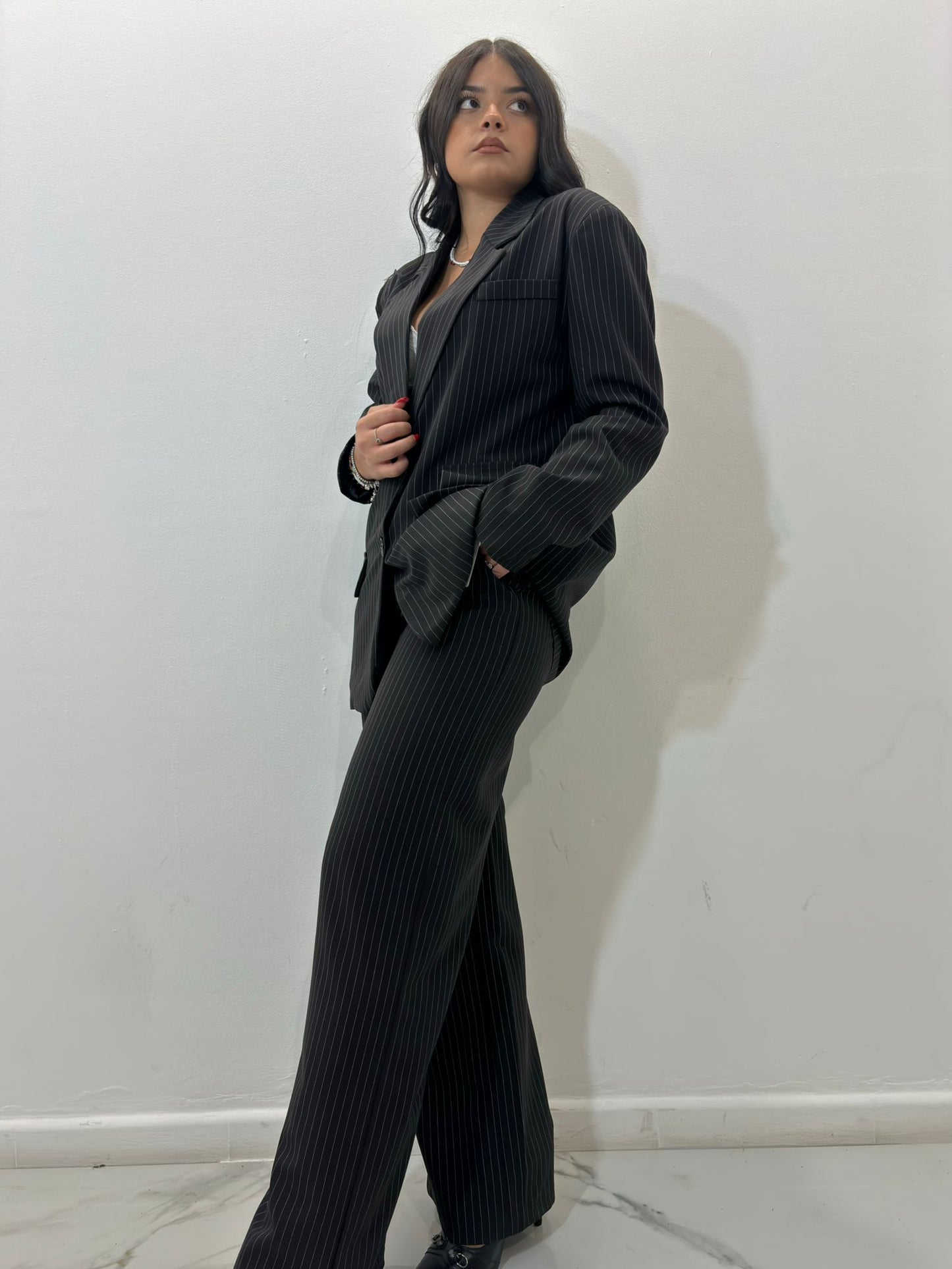 Tailleur gessato nero